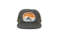Green cap with 'Wild Horses' logo on a white background