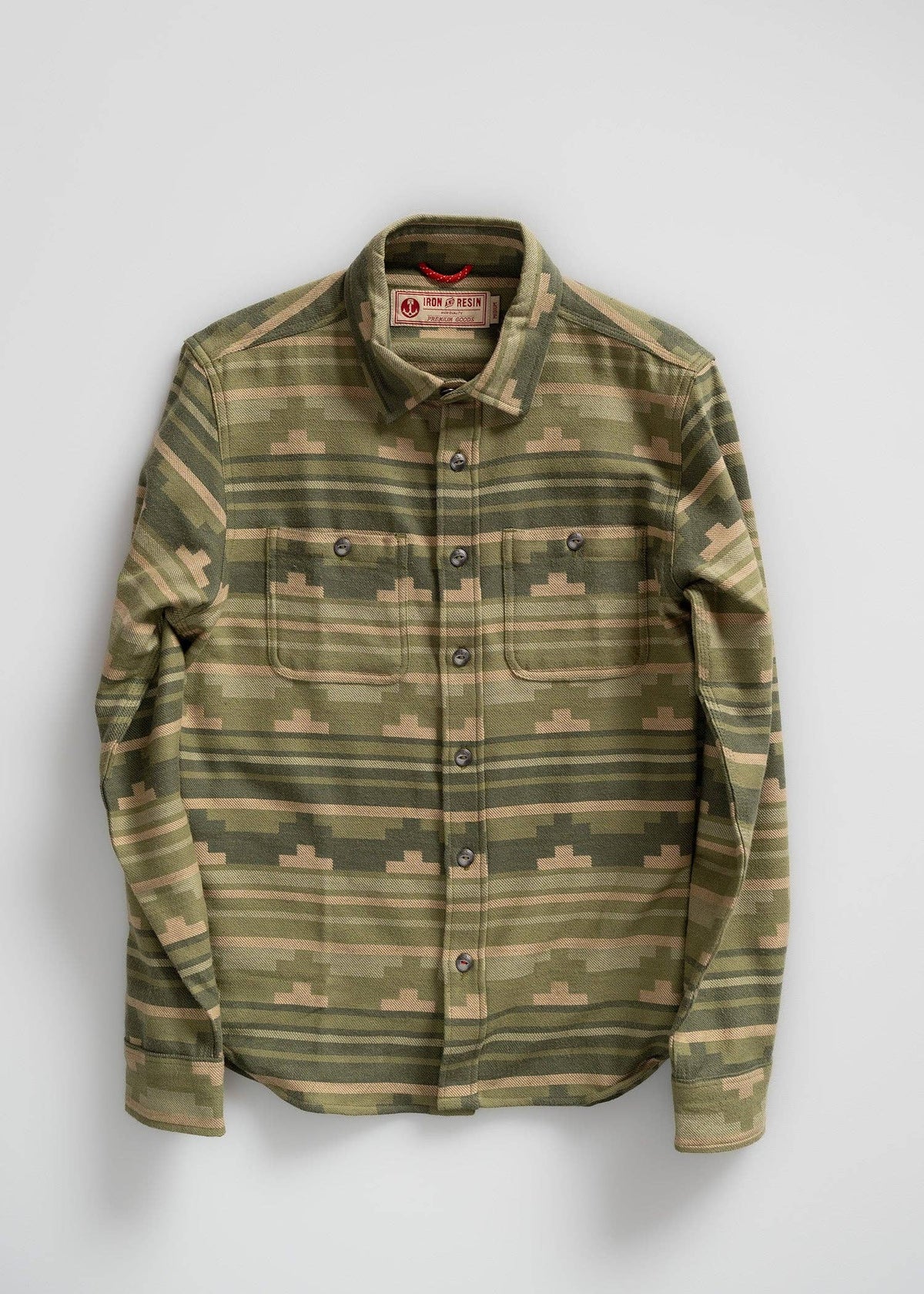 Green camouflage shirt on a white background