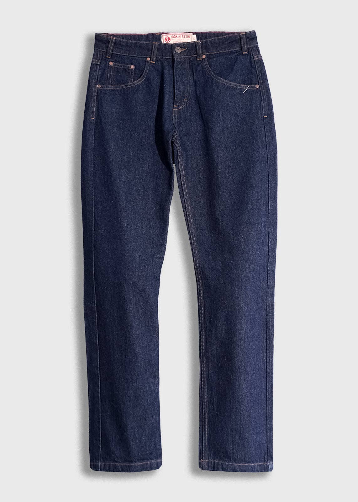 Pair of blue jeans on a light gray background