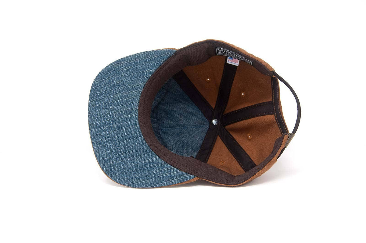 Two baseball caps, one blue and one brown with black trim, on a white background.