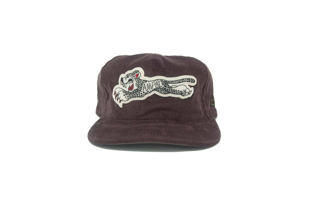 Brown cap with a white panther logo on a white background