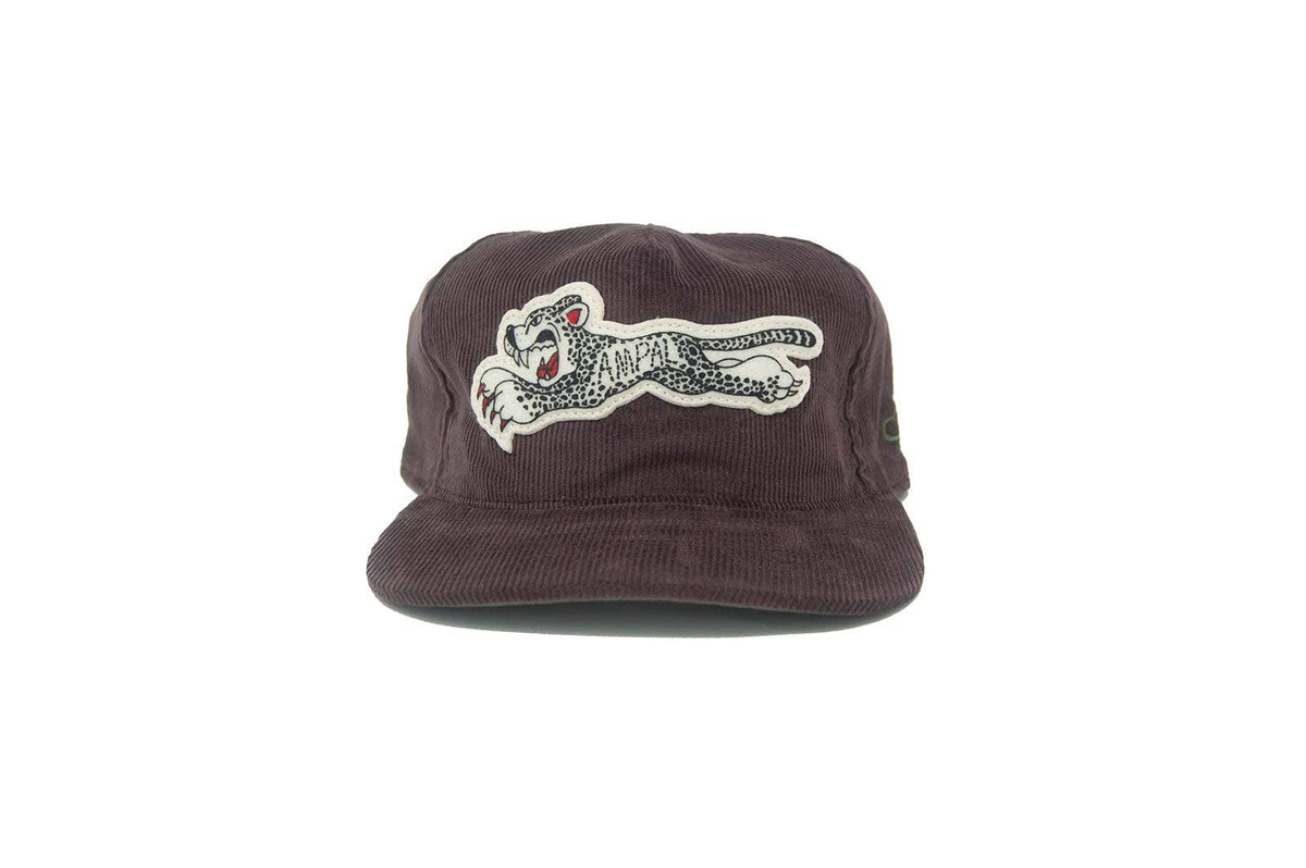 Brown cap with a white panther logo on a white background