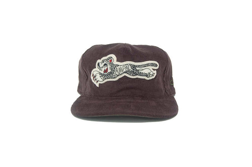Brown cap with a white panther logo on a white background