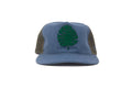 Blue cap with green leaf design on a white background