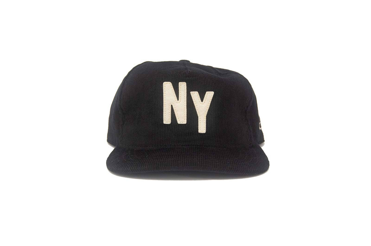 Black cap with 'NY' on a white background