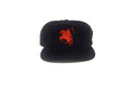 Black cap with orange logo of the reaper on a horse on a white background