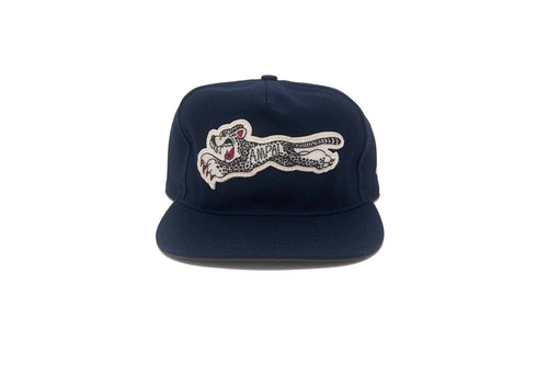 Navy blue cap with a embroidered tiger design on a white background
