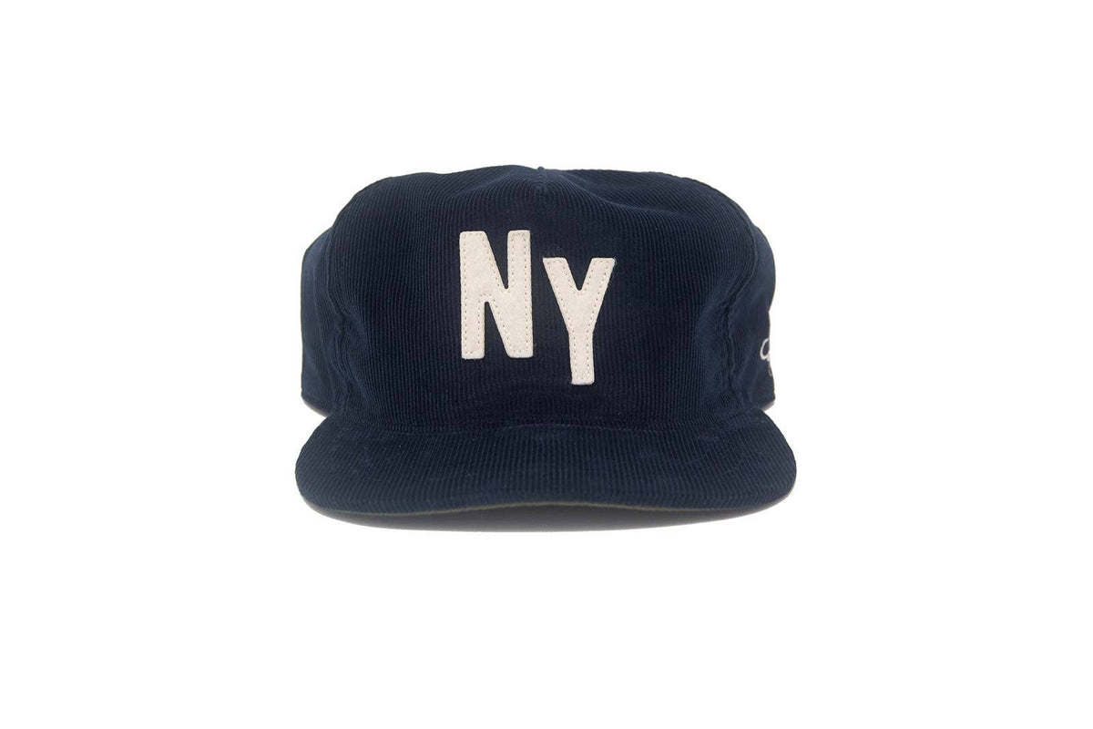Navy blue cap with 'NY' embroidered on a white background