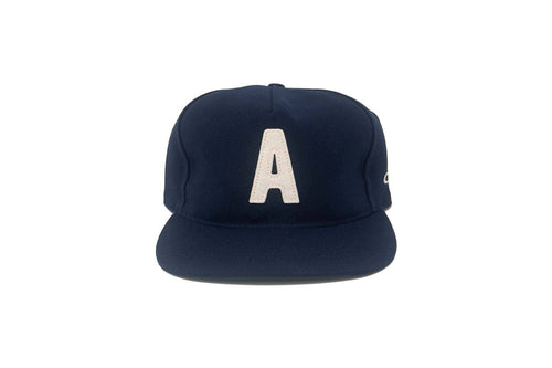 Navy blue cap with a white letter 'A' on a white background