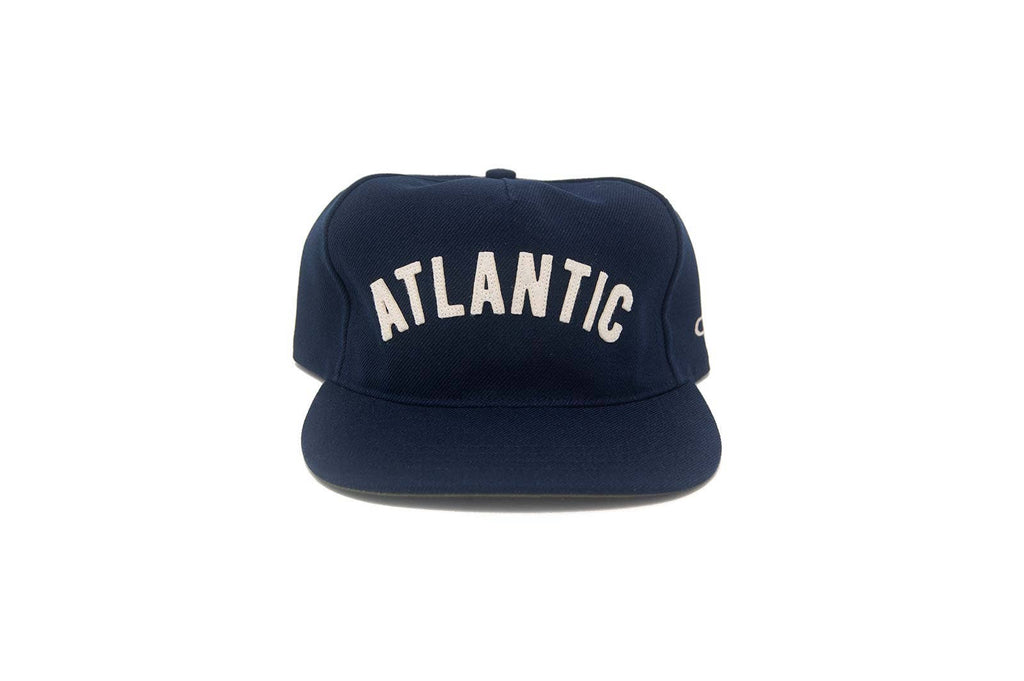 Navy blue cap with 'Atlantic' text on a white background