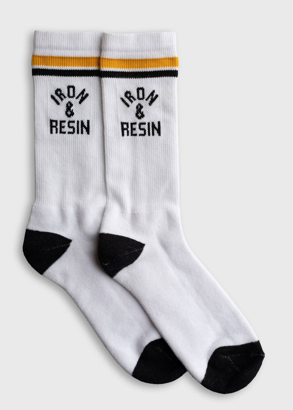 White socks with black text and accents on a white background