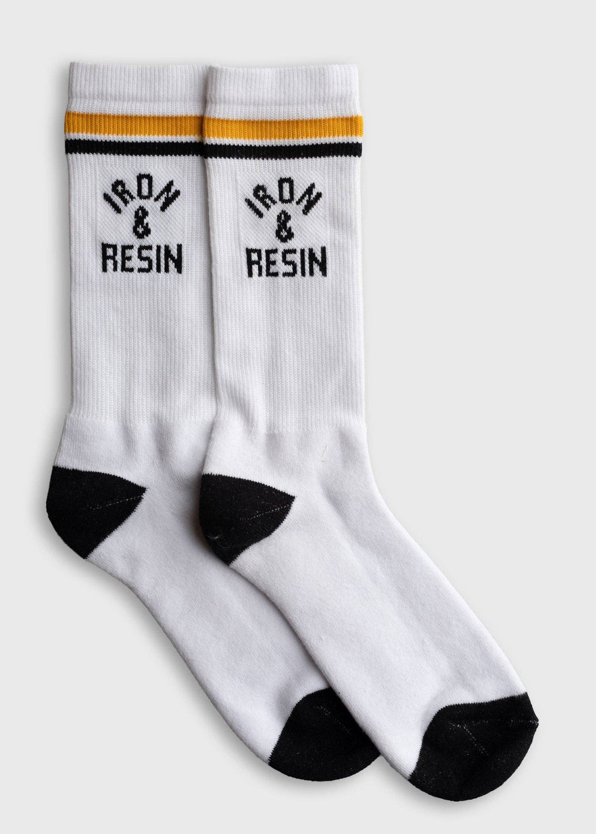 White socks with black text and accents on a white background