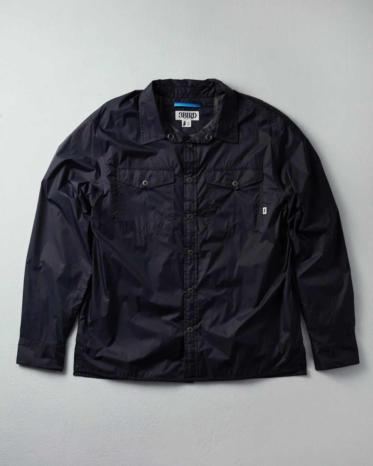 Black jacket on a light gray background