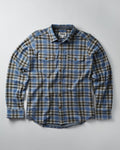 Plaid shirt with visible brand logo on a gray background