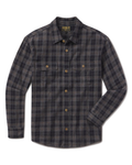 A long-sleeve button-up flannel shirt in a dark gray and black plaid pattern, featuring two chest pockets with button flaps and brass-colored buttons, shown against a plain white background.