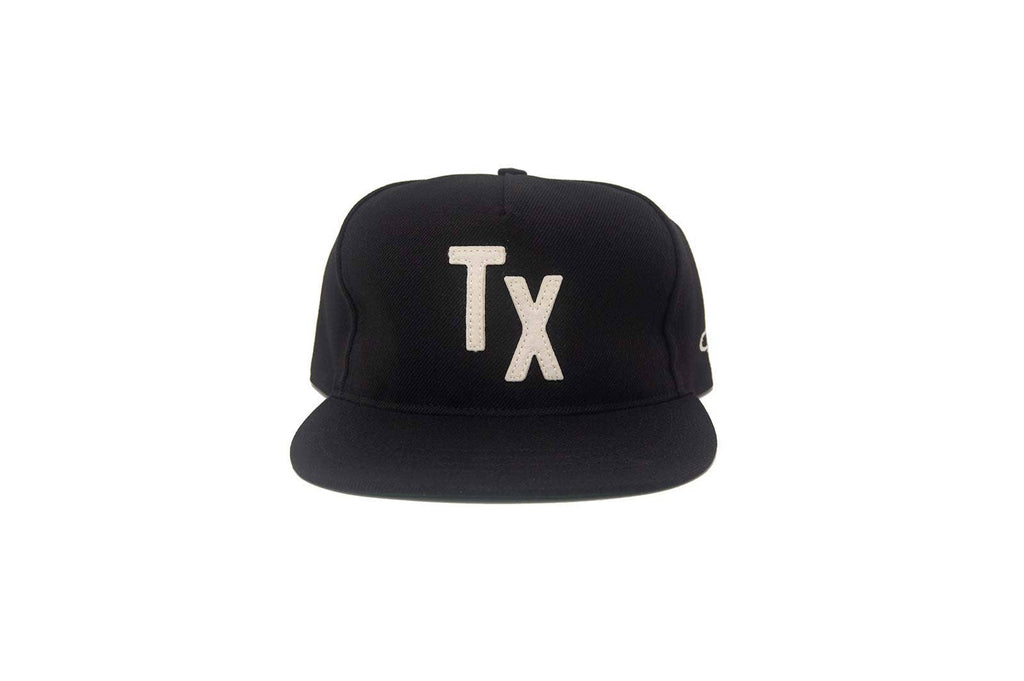 Black cap with 'TX' logo on a white background