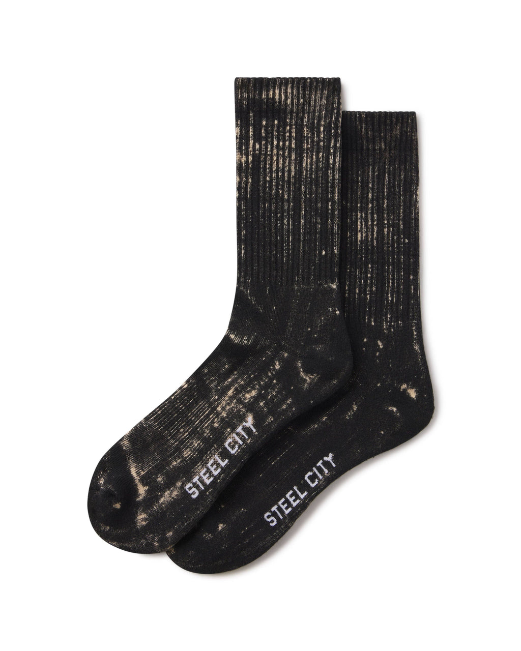 A pair of black crew socks with a distressed, faded beige pattern and the brand name 'STEEL CITY' printed in white on the toes, shown on a plain white background.