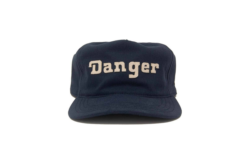 Navy blue cap with 'Danger' text on a white background
