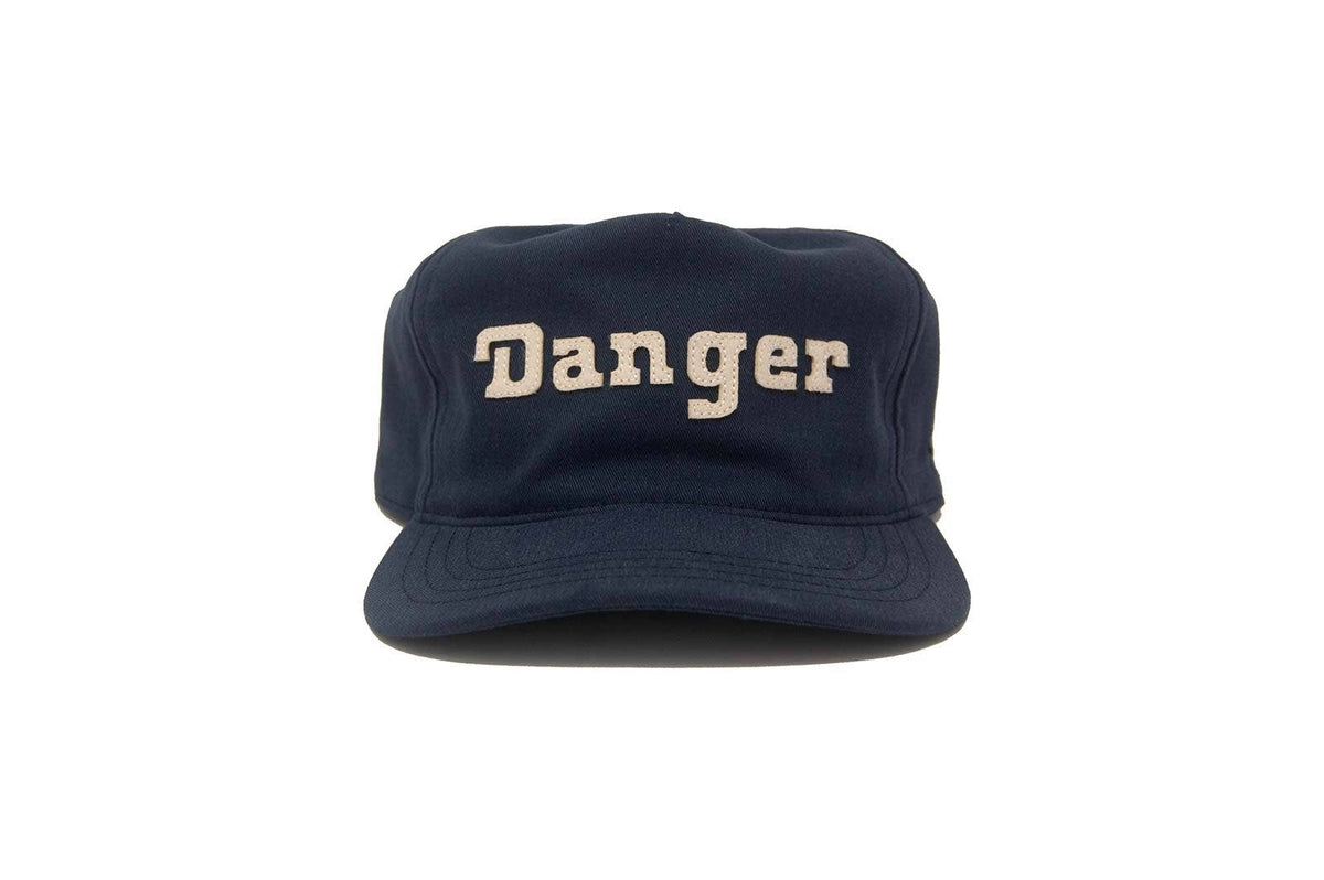 Navy blue cap with 'Danger' text on a white background